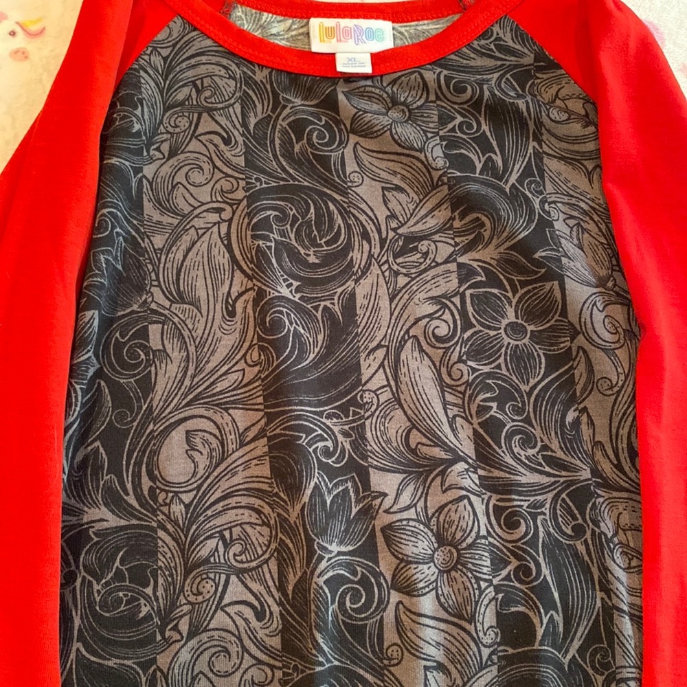 Original never worn tags still on LuLaRoe Randy Shirt